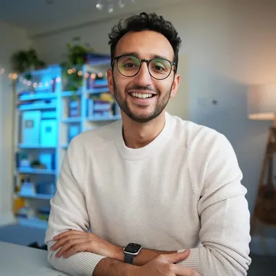 Ali Abdaal in a portrait published on his official website.