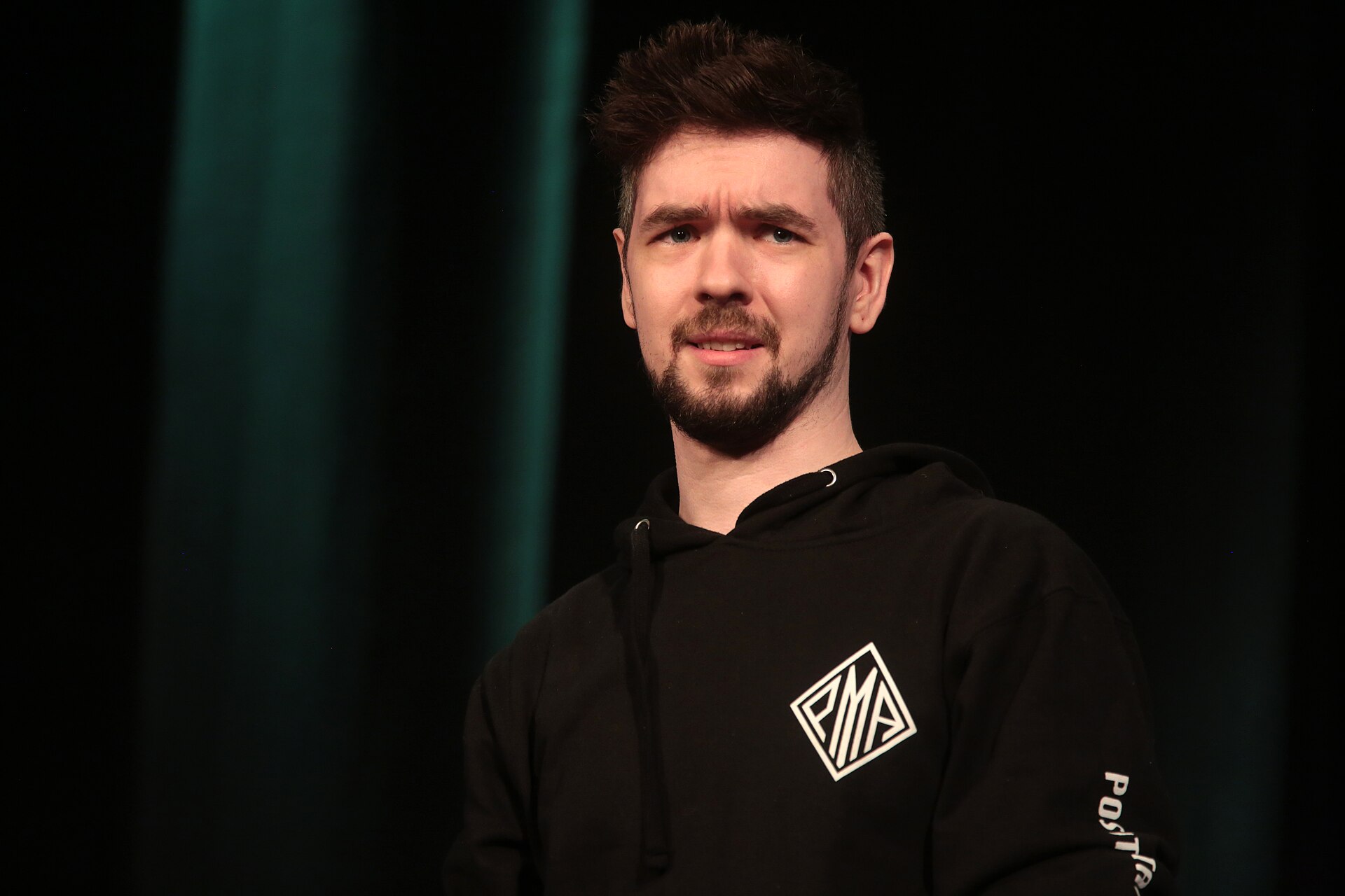 Jacksepticeye speaking with attendees at the 2018 PAX West at Benaroya Hall in Seattle, Washington.