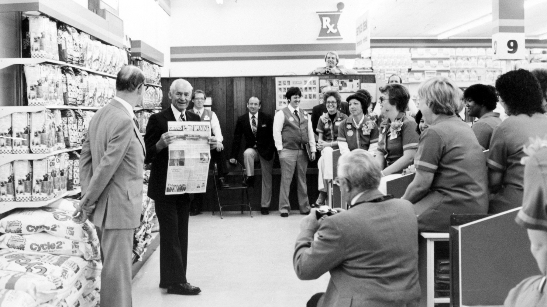 Sam Walton addressing associates during a store visit.