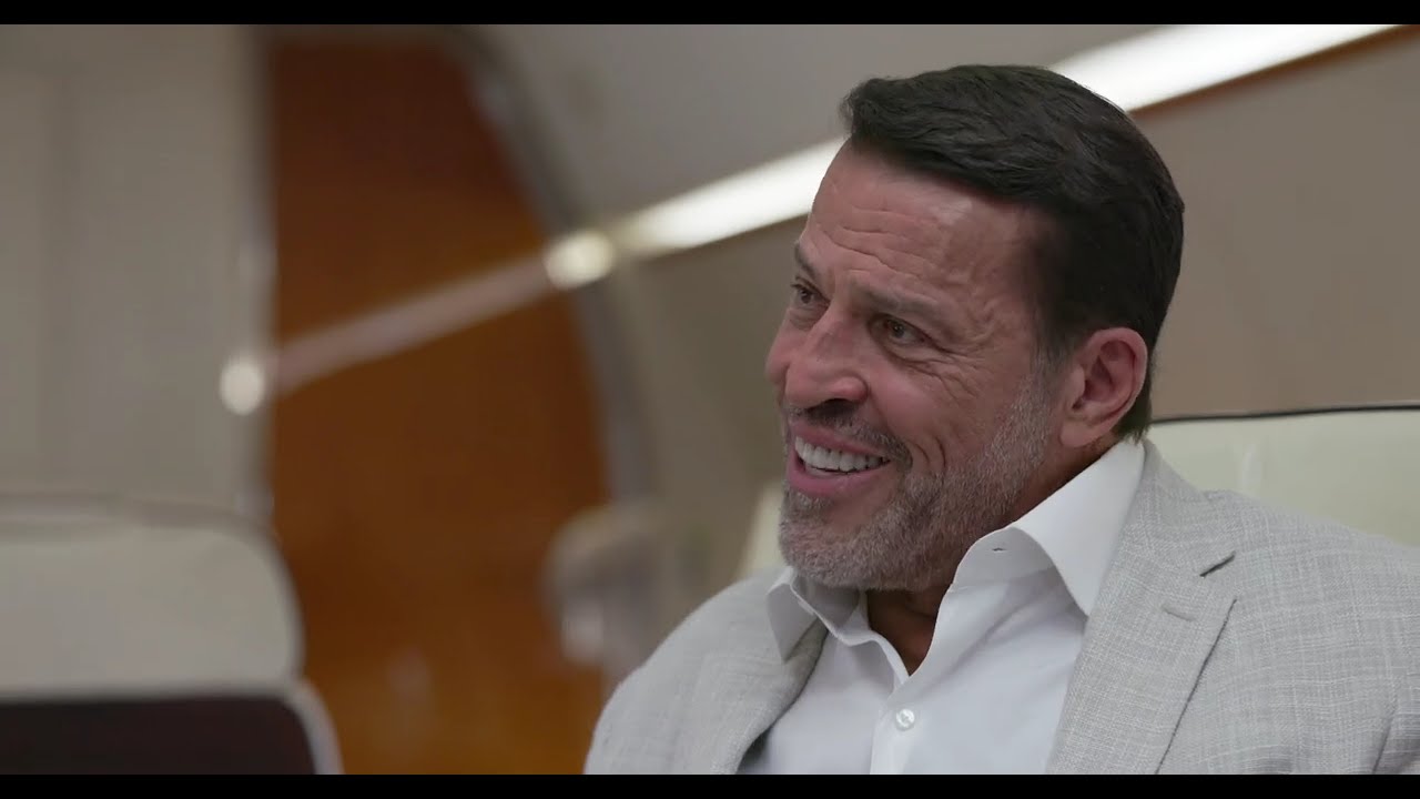 Tony Robbins in a recorded appearance.