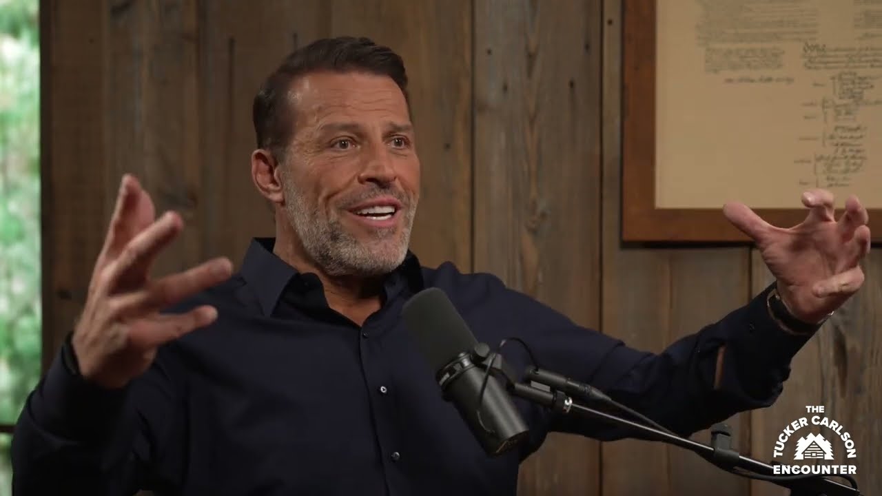 Tony Robbins in a recorded appearance.