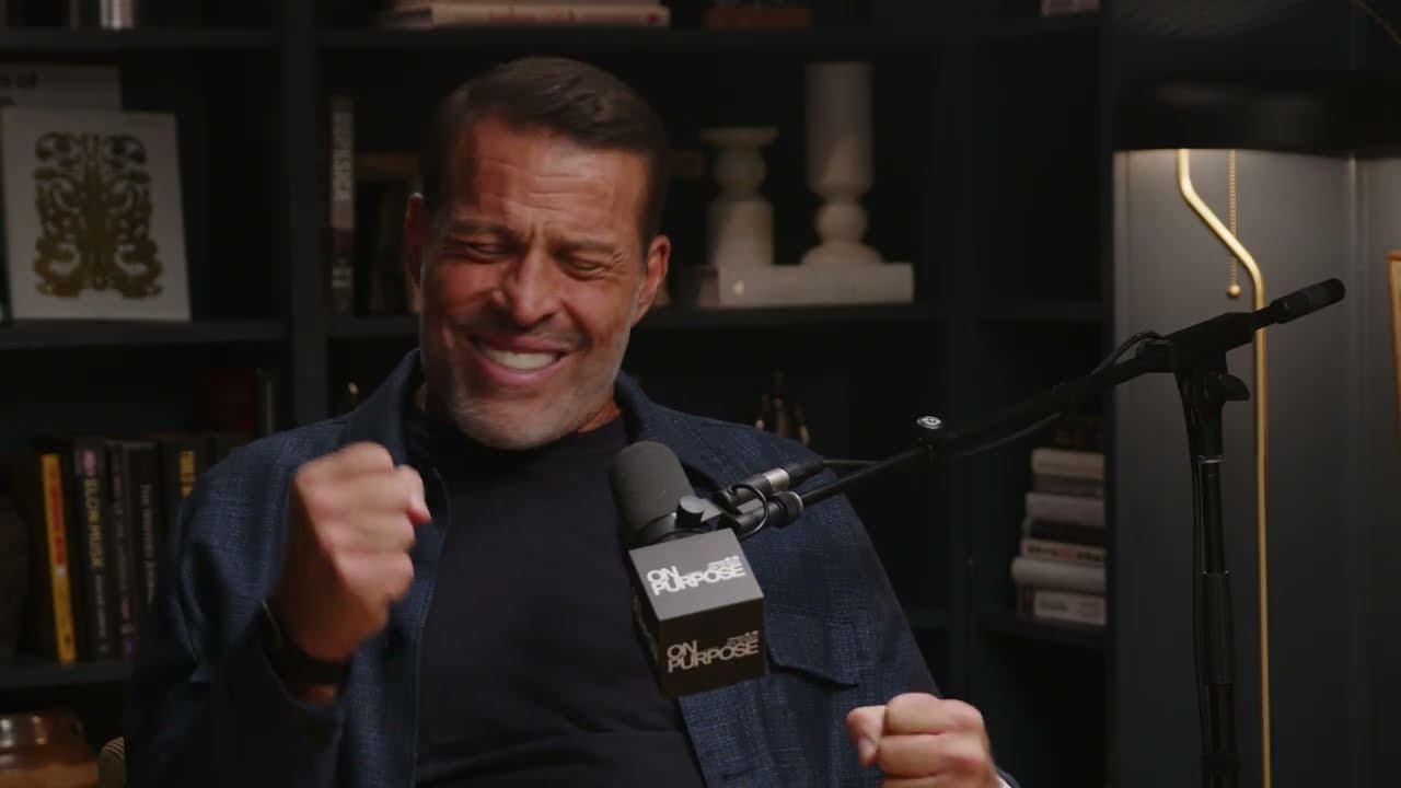 Tony Robbins in a recorded appearance.