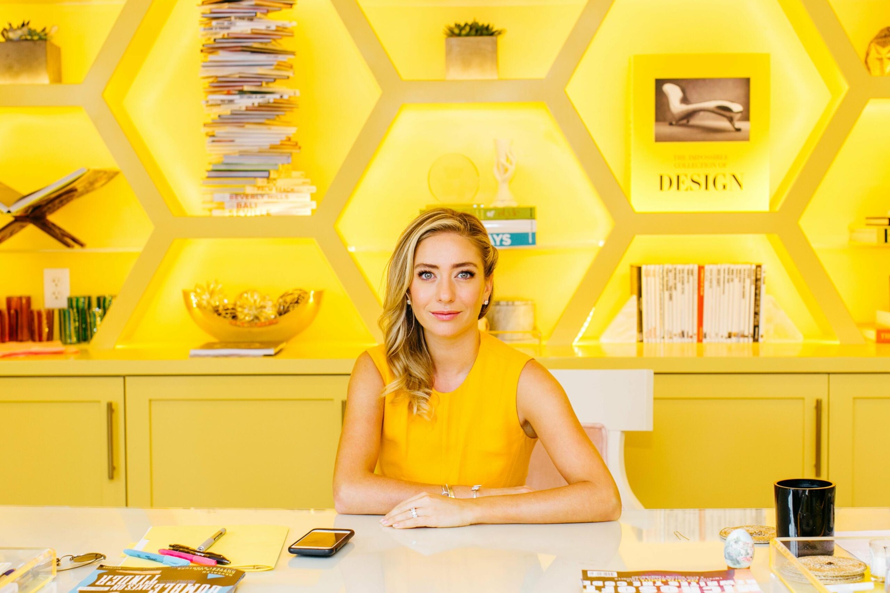 Whitney Wolfe Herd at her desk in Bumble's office.